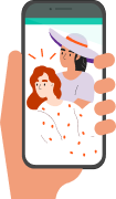 Hand holding a mobile phone with two people on the screen