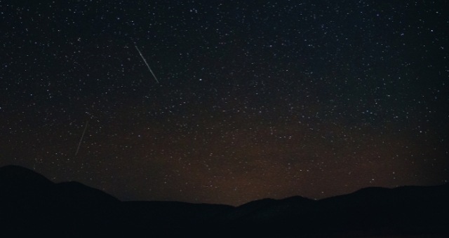 The Geminids falling from the dark sky of Fuerteventura, Spain