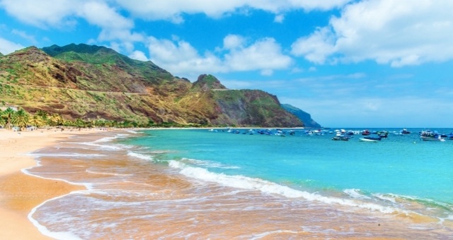 The turquoise water of the golden beach Las Teresitas in Tenerife, Spain