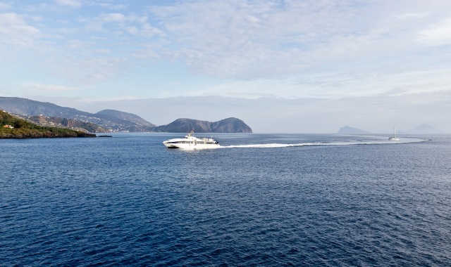 Ferry sailing towards the scenic Aeolian archipelago, Italy