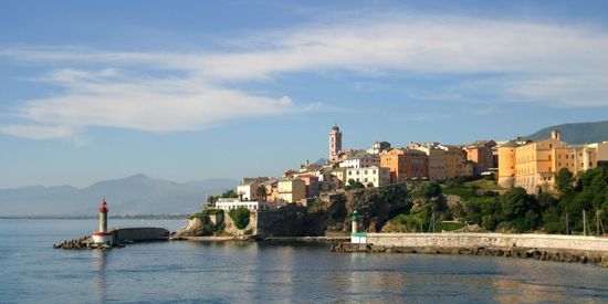 The old city center, lighthouse and port of Bastia town in Corsica, France