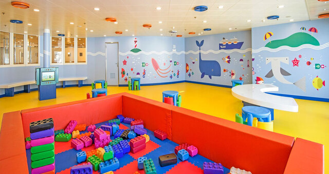 Children's play room with Lego, drawings and tables on a GNV ship