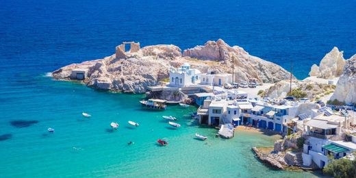 White-and-blue houses in Firopotamos village in Milos island, Cyclades, Greece