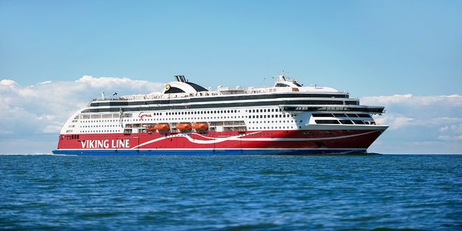 The Viking Grace ferry sailing across open sea under clear skies.