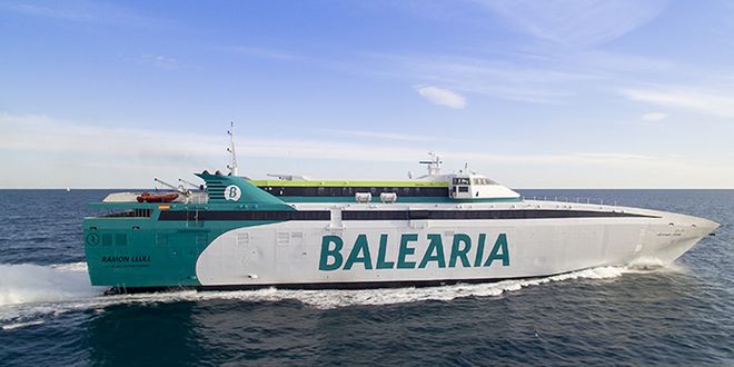 A high-speed Baleària ferry named Ramon Llull cruising across the calm blue open sea