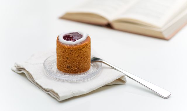 Runeberg torte with raspberry jam encircled by a ring of icing on top